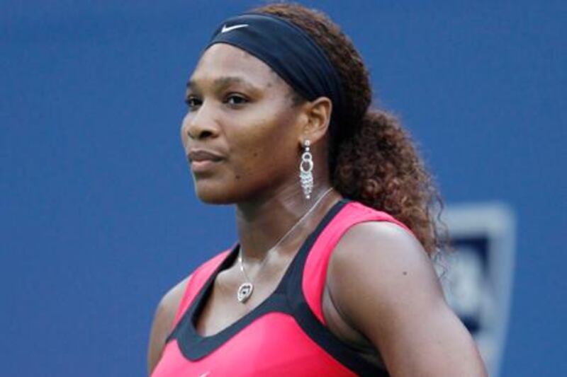 Serena Williams reacts during the women's championship match against Samantha Stosur of Australia at the U.S. Open tennis tournament in New York, Sunday, Sept. 11, 2011. (AP Photo/Charles Krupa) 