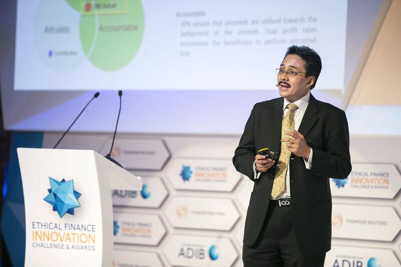 Mohd Izani Ghani, the executive director of Khazanah Nasional, during his presentation at the Ethical Finance Innovation Challenge and Awards ceremony where is company is a finalist under the Islamic Finance Industry Development Award category. Reem Mohammed / The National