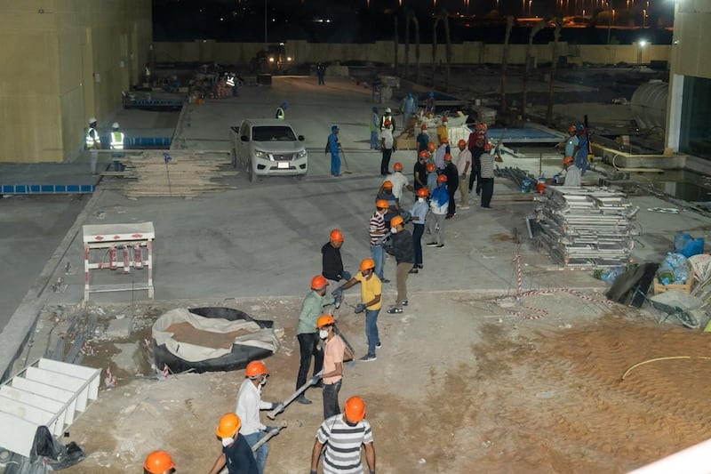 Worshippers say they could not miss the opportunity of helping out at the site before the Hindu temple formally opens in Abu Dhabi. Photo: BAPS Hindu Mandir