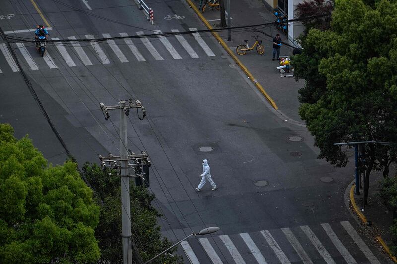 Shanghai roads are free of traffic as transport is confined to health workers and people needing emergency treatment. AFP