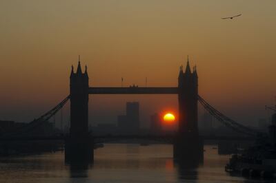 The sun rises over Tower Bridge in London, U.K., on Friday, Feb. 7, 2020. The European Union will consider about 40 equivalence decisions this year, determining how much equity, fixed-income and other investment banking business can remain in London and still serve EU clients. Photographer: Simon Dawson/Bloomberg