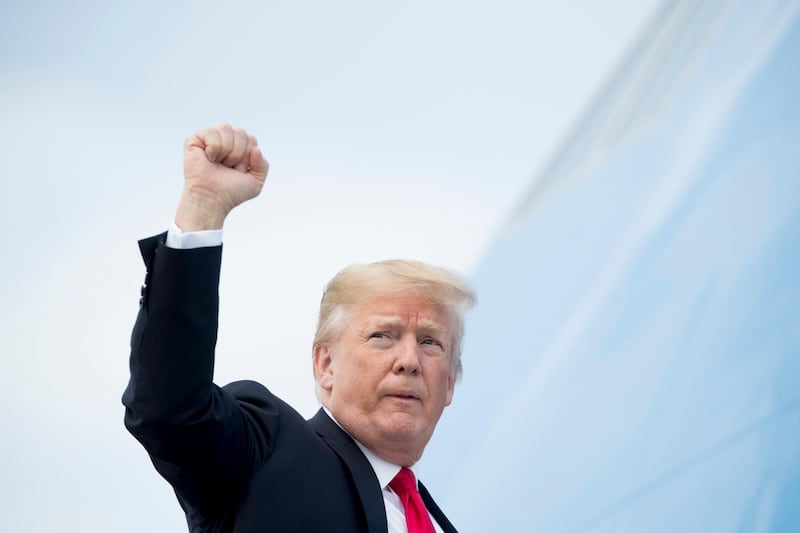 President Donald Trump gestures as he boards Air Force One at Andrews Air Force Base, Md., Tuesday, May 29, 2018, to travel to Nashville, Tenn. (AP Photo/Andrew Harnik)