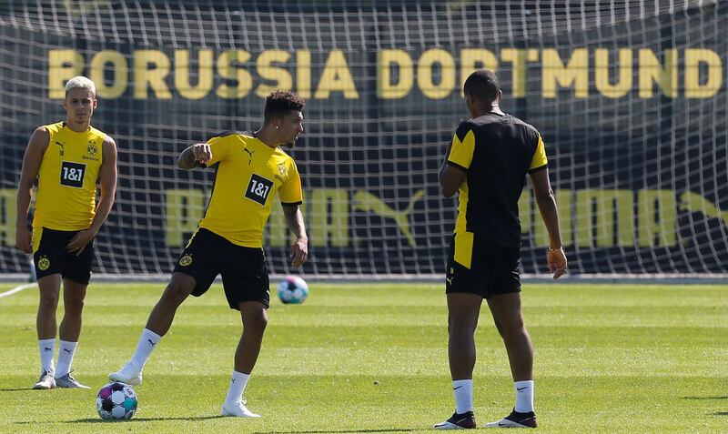 Borussia Dortmund's Jadon Sancho with teammates during training. Reuters