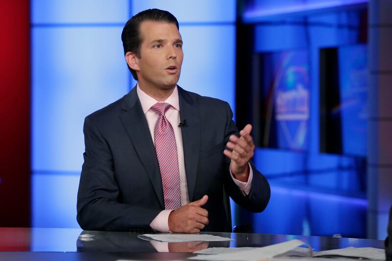 Donald Trump Jr being interviewed by host Sean Hannity on his Fox News Channel television programme in New York on July 11, 2017. His father, President Donald Trump defended his son on Wednesday, July 12 after being silent on the matter for days. Richard Drew/AP Photo