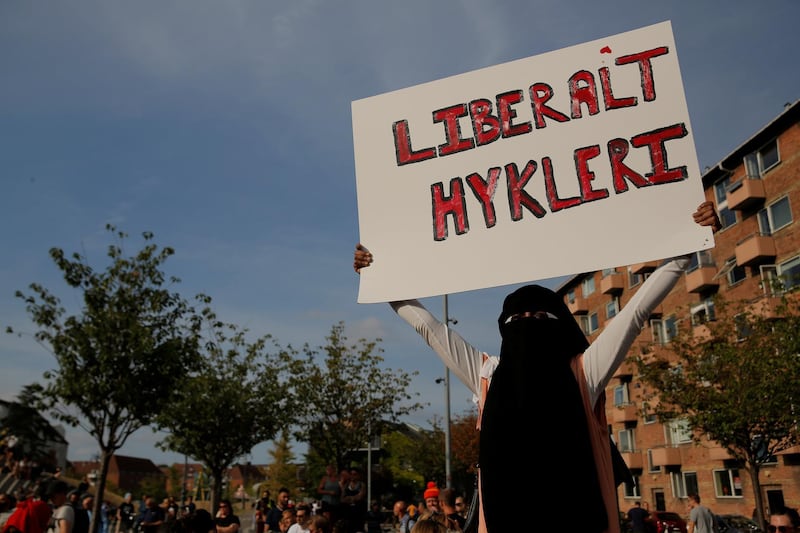People participate in a demonstration against the Danish face veil ban. Reuters