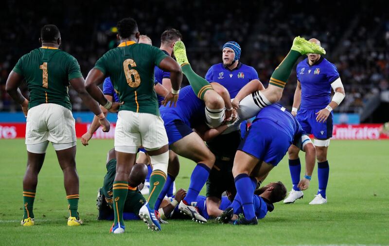 Rugby Union - Rugby World Cup 2019 - Pool B - South Africa v Italy - Shizuoka Stadium Ecopa, Shizuoka, Japan - October 4, 2019. Italy's Andrea Lovotti in action with South Africa's Duane Vermeulen and is later shown a red card. REUTERS/Peter Cziborra