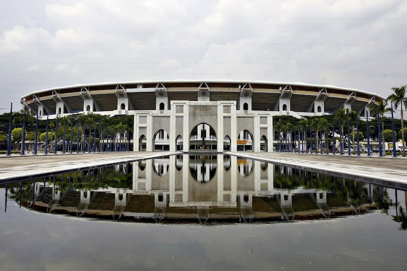 The Bukit Jalil National Stadium, primary venue for the 2007 AFC Asian Cup 2007 matches co-hosted by Malaysia, is seen by a reflecting pool in Bukit Jalil, near Kuala Lumpur, 17 May 2007. The 2007 AFC Asian Cup will be held this 07-29 July, and co-hosted by Indonesia, Malaysia, Thailand and Vietnam. AFP PHOTO/TENGKU BAHAR (Photo by TENGKU BAHAR / AFP)