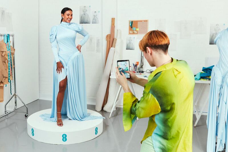 Maya Jama posing for designer Richard Malone in his 5G dress.