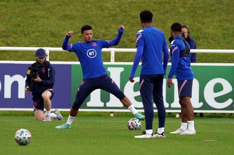 Jadon Sancho (centre) during an England training session at St George's Park.