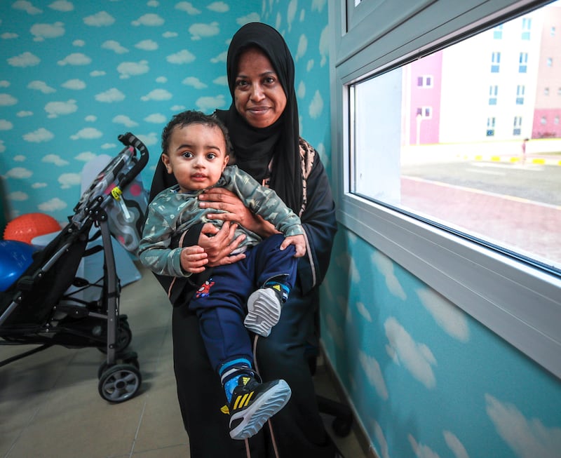 One-year-old Rakan Saif with his grandmother Manal Abdulla

