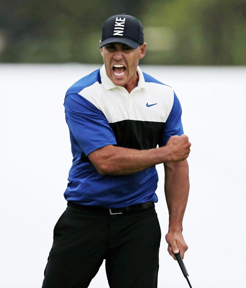 Brooks Koepka reacts after sinking a putt on the 18th green to win the PGA Championship. AP Photo