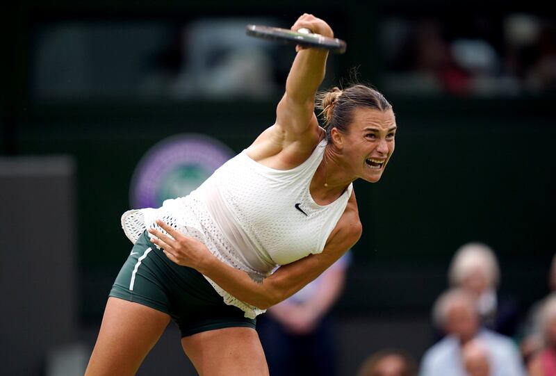 Aryna Sabalenka serves against Ons Jabeur at the All England Club in Wimbledon. PA