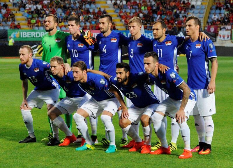 Liechtenstein’s national soccer team pose before match. Eloy Alonso / Reuters