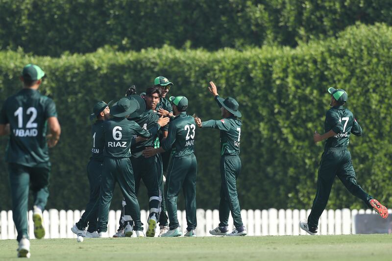 Pakistan fast bowler Mohammad Zeeshan, centre, continued his good form by picking up four wickets against India in Dubai