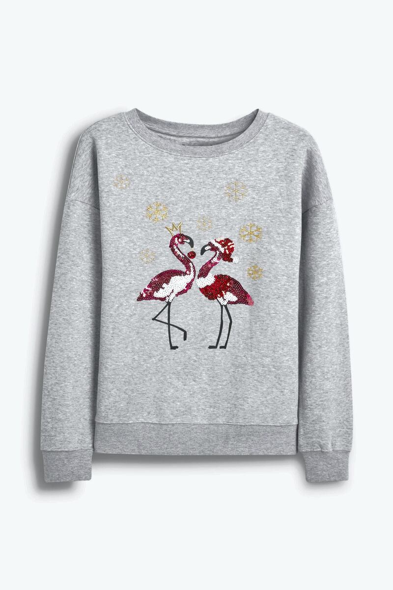 It is always worth taking something to ward off the night chill, so why not try this cute jumper by Next?