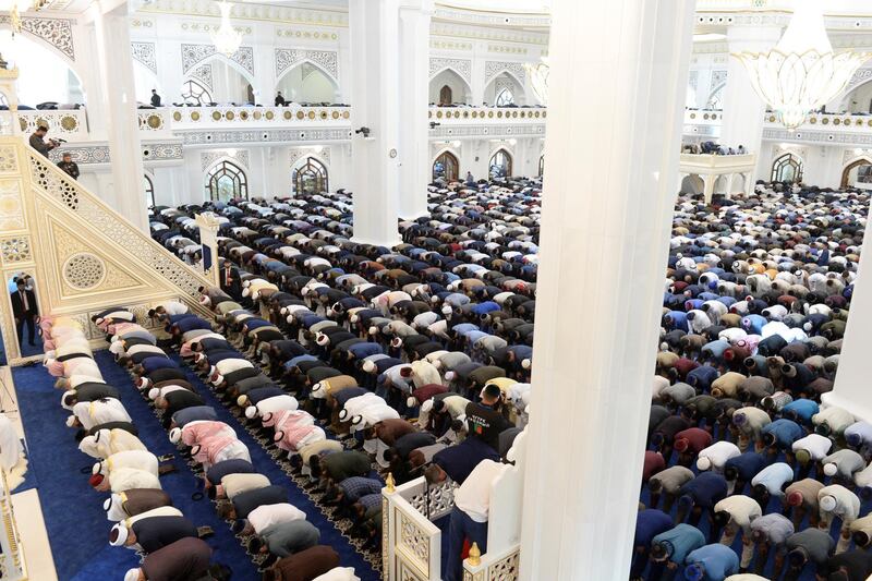 Muslims pray at a new mosque named after the Prophet Mohammed.