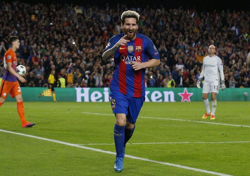 Barcelona’s Lionel Messi celebrates scoring their third goal. Albert Gea / Reuters