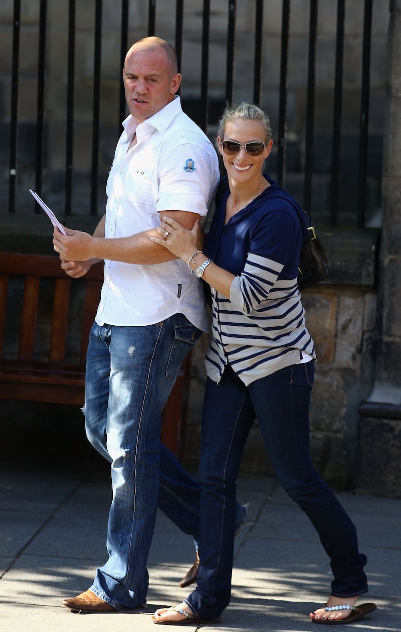 Zara Phillips, wearing a striped cardigan and jeans, and Mike Tindall leave their wedding rehearsal at Canongate Kirk on July 29, 2011 in Edinburgh, Scotland. Getty Images