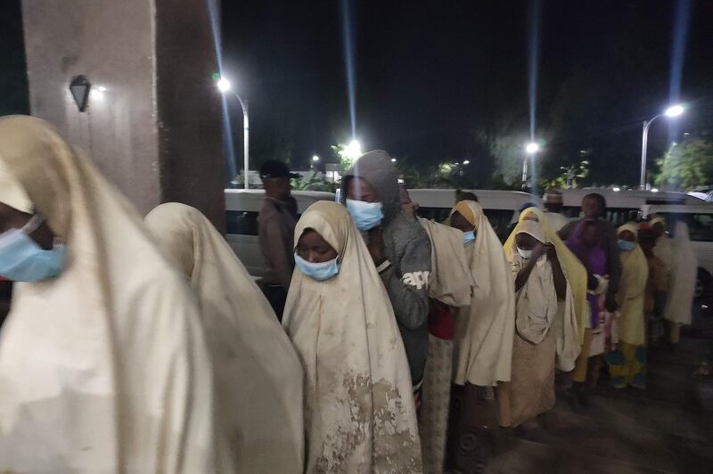 A group of girls previously kidnapped from their boarding school in northern Nigeria arrive at the Government House in Gusau, Zamfara State upon their release. AFP
