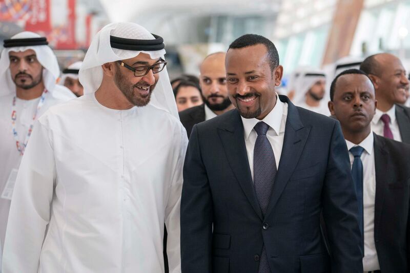 ABU DHABI, UNITED ARAB EMIRATES - March 18, 2019: HH Sheikh Mohamed bin Zayed Al Nahyan, Crown Prince of Abu Dhabi and Deputy Supreme Commander of the UAE Armed Forces (L) and HE Abiy Ahmed, Prime Minister of Ethiopia (R), tour the Special Olympics World Games Abu Dhabi 2019, at Abu Dhabi National Exhibition Centre (ADNEC).

( Ryan Carter / Ministry of Presidential Affairs )?
---