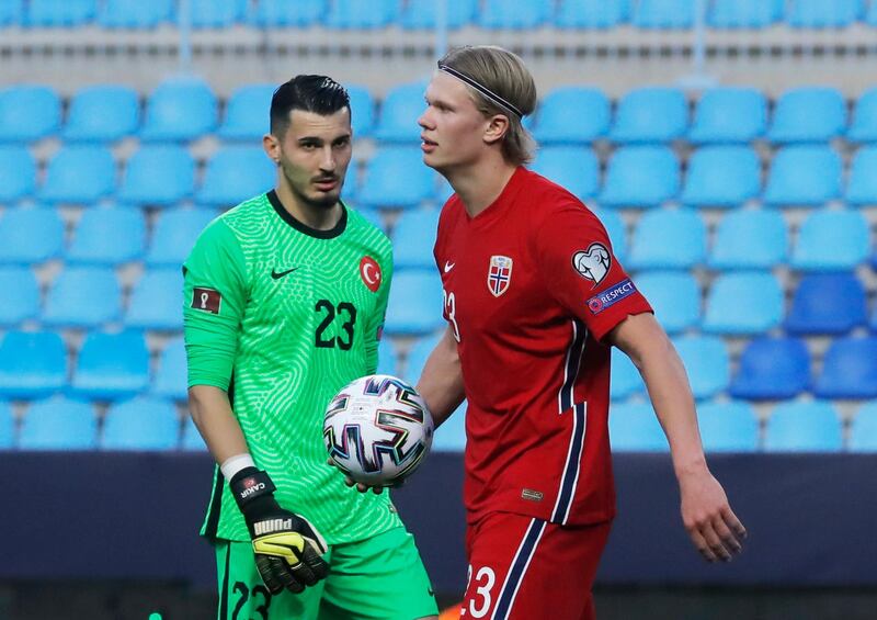 Norway's Erling Braut Haaland and Turkey goalkeeper Ugurcan Cakir. Reuters