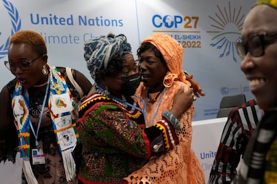 Two women embrace at a session for women and gender at the UN summit in Sharm El Sheikh, Egypt. AP