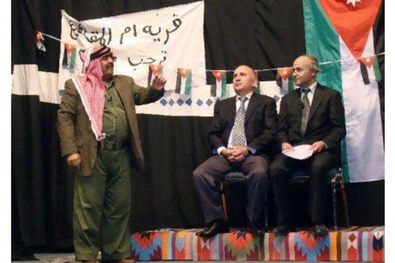 The Jordaian comedian Musa Hijazin, left, as Abu Saqr, Heorge Hijazin, centre, as Jordan's prime minister and Hikmat Daewish impersonating a senior official in the play Now I Understand You.