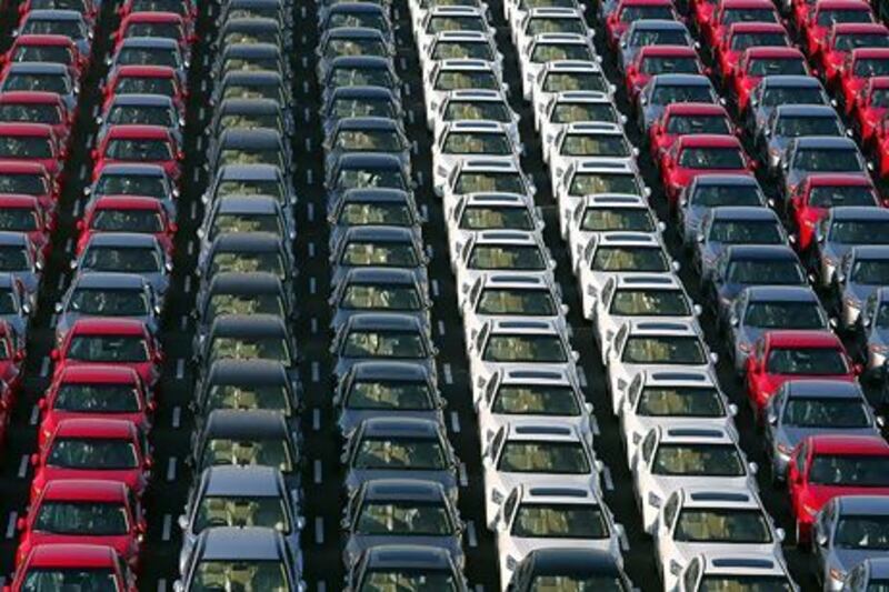 Cars are being readied for shipment at the Port of Yokohama in Japan. Koichi Kamoshida / Getty Images