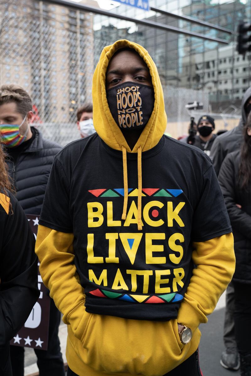 A man wears a Black Lives Matter shirt at a protest against police brutality in downtown Minneapolis. Willy Lowry / The National