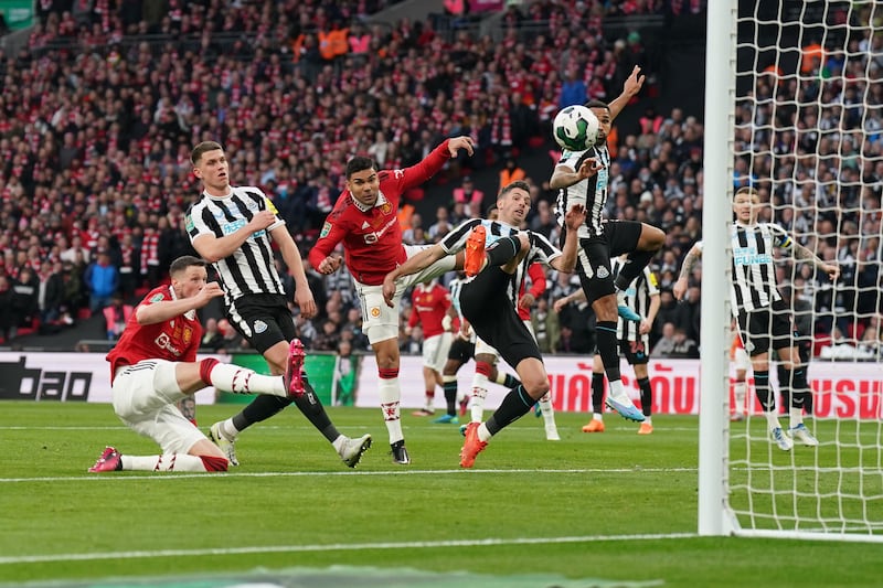 Manchester United's Casemiro scores their first goal against Newcastle United in the League Cup final at Wembley Stadium on Sunday, February 26, 2023. PA
