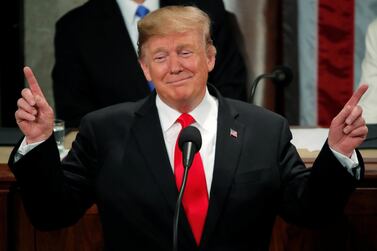 U.S. President Donald Trump gestures during his State of the Union address to a joint session of Congress on Capitol Hill in Washington, U.S., February 5, 2019. REUTERS/Jim Young - HP1EF2609Y97U TPX IMAGES OF THE DAY
