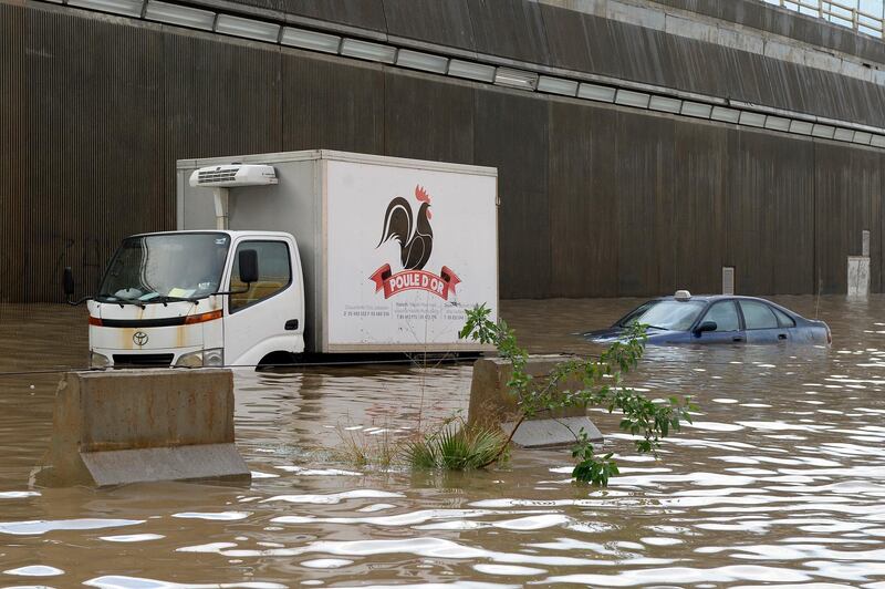 Vehicles are stuck in a flooded tunnel after a heavy downpour on the main road near Rafic Hariri International Airport at the southern entrance of Beirut.  EPA