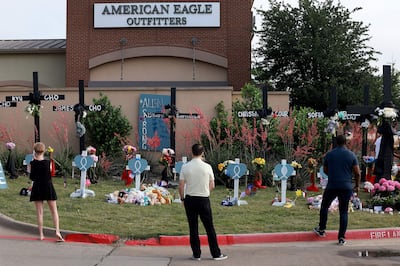The memorial set up near the scene of a mass shooting at the Allen Premium Outlets mall in Allen, Texas. Getty / AFP 