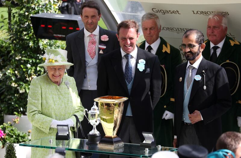 Sheikh Mohammed bin Rashid, Queen Elizabeth II and Charlie Appleby during day five of Royal Ascot at Ascot Racecourse. Jonathan Brady / PA Wire