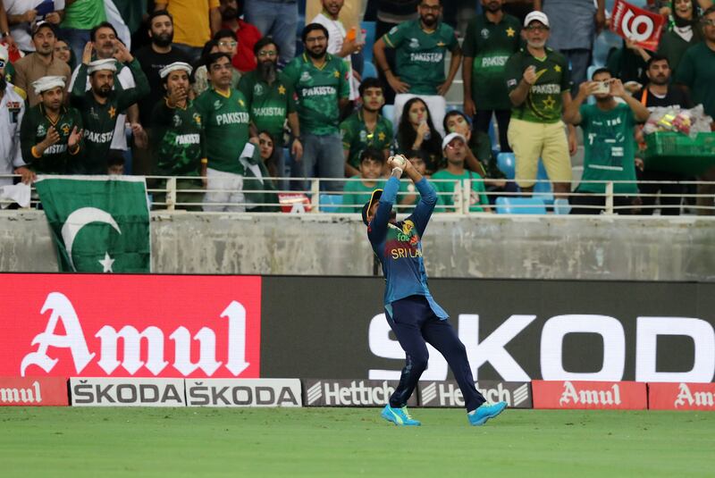 Pathum Nissanka takes the catch of Pakistan's Usman Qadir.