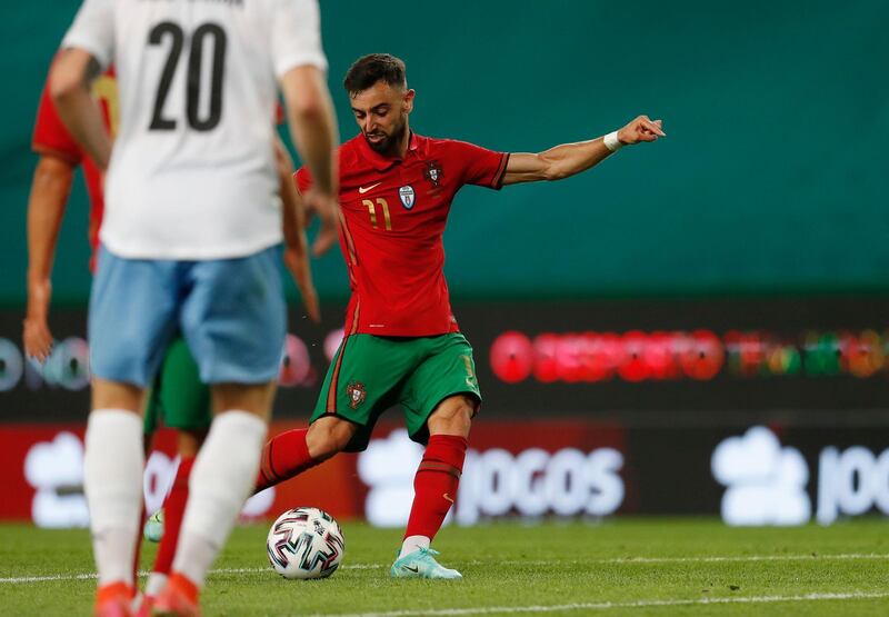 Portugal's Bruno Fernandes scores their fourth goal in a 4-0 win. Reuters