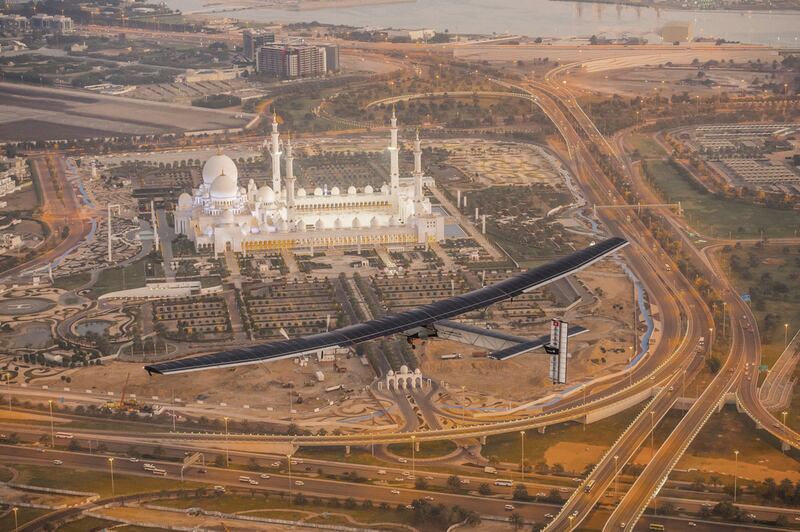 'Solar Impulse 2' flies past the Sheikh Zayed Grand Mosque in Abu Dhabi. The solar-powered aircraft began and ended its 2015-2016 circumnavigation of the world in the UAE's capital.