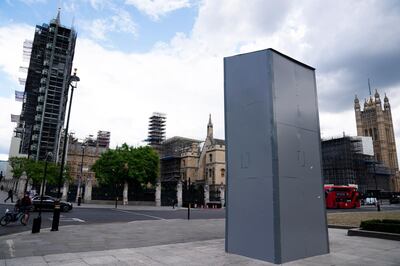 epa08488639 A picture showing the a boarded up statue of Former British Prime Minister Winston Churchill in Parliament Square, Central London, Britain, 16 June 2020. London's Mayor, Sadiq Khan, said the capital's landmarks would be review​ed by a commission to removing those with links to slavery.  EPA/WILL OLIVER