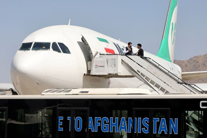 A Mahan Air jet at Kabul International Airport in Afghanistan in 2021. Officials in Argentina are questioning the crew of a Venezuelan aircraft that formerly belonged to Mahan about possible ties to Iran's IRGC. AFP