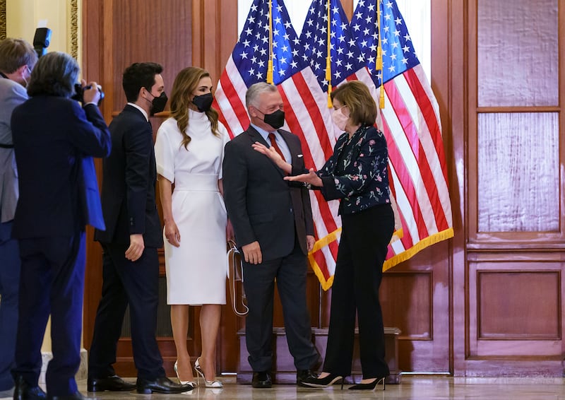 Queen Rania, in white Roksanda, meets Speaker of the House Nancy Pelosi, with King Abdullah II and Crown Prince Hussein at the Capitol in Washington, DC on Thursday, July 22.