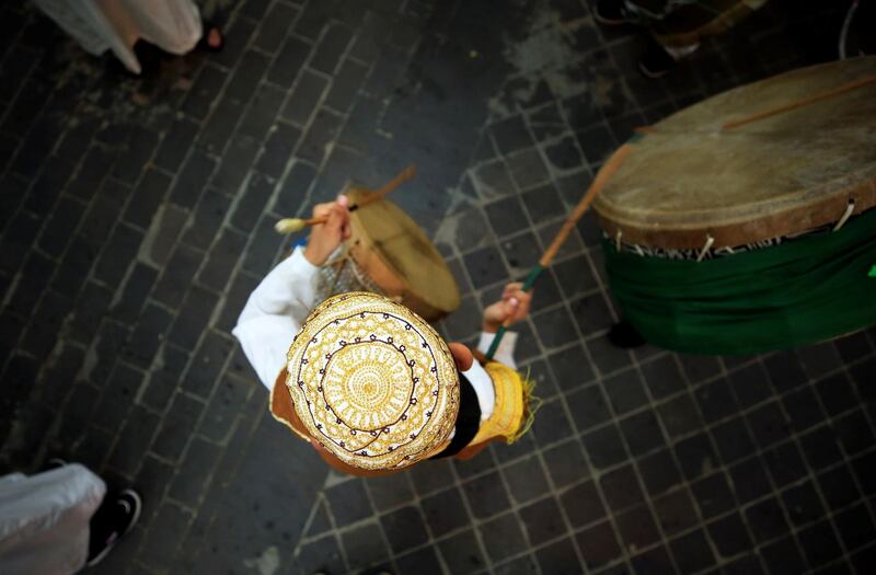 Members of a traditional band beat drums during Ramadan, amid concerns over the spread of coronavirus disease, in Sidon's old city, southern Lebanon. REUTERS