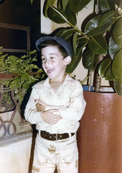 A young Robert, aged six, on the balcony of the family home in 1978 in Tripoli, where his adaptation skills were honed as a war child. Photo: Robert Mardini
