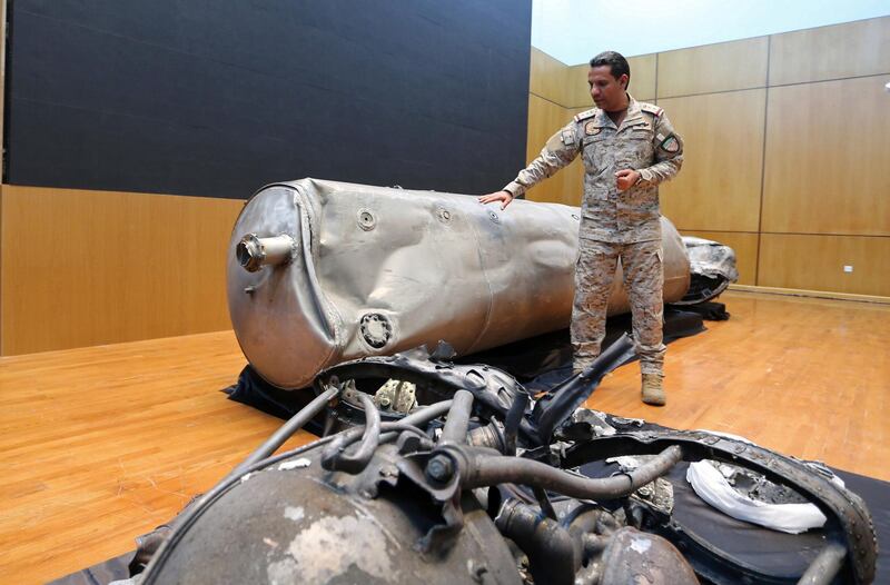 Saudi-led coalition spokesman, Colonel Turki Al Malki, displays the debris of a ballistic missile launched by Yemen's Houthi rebels headed towards Riyadh. Reuters