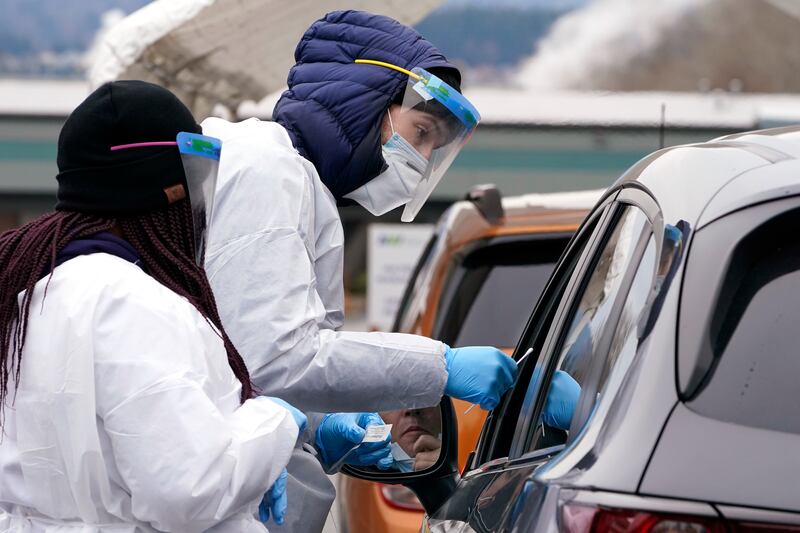 A drive-through testing centre in Bellingham, Washington. The US state, which was hit hard early in the pandemic, has reported at least 400 cases of Omicron. AP