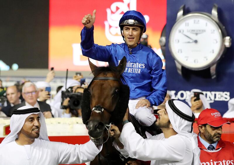 Dubai, United Arab Emirates - March 30, 2019: Sheikh Hamdan bin Mohammed Al Maktoum holds Thunder Snow which was ridden by Christophe Soumillon after winning the Dubai World Cup during the Dubai World Cup. Saturday the 30th of March 2019 at Meydan Racecourse, Dubai. Chris Whiteoak / The National