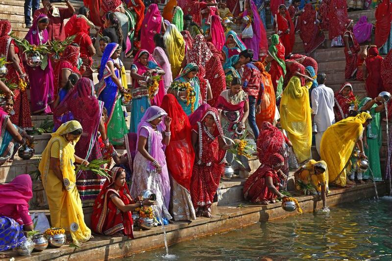 Hindu women collect water from the Pushkar lake to pour on idols of Lord Shiva, on THE occasion of the Mahashivratri festival in Pushkar.  Rajesh Kumar Singh / AP Photo