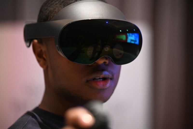 A virtual reality headset. Apple's mixed-reality headset combines both VR and augmented reality. AFP