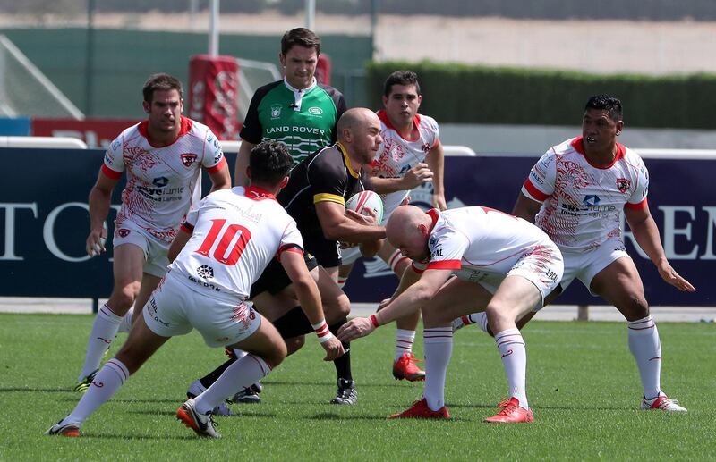 DUBAI , UNITED ARAB EMIRATES , March 29 – 2019 :- UAE Conference final rugby match between Dubai Tigers ( white ) vs Al Ain Amblers (black) going on at the Sevens Rugby Ground on Dubai- Al Ain road in Dubai.( Pawan Singh / The National ) For Sports/Online. Story by Paul