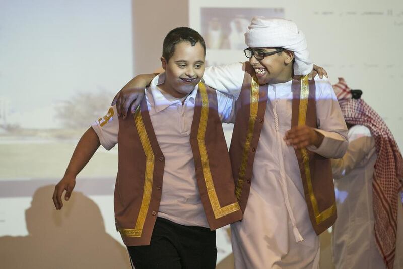 The students of Zayed Higher Organisation enjoy dancing at the charity bazaar of Humanitarian Care and Special Needs. It featured crafts they made in their workshop classes. Mona Al Marzooqi / The National 