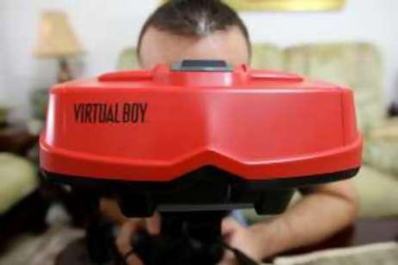 
SHARJAH, UNITED ARAB EMIRATES- Sep 8: Hasan Omran playing rare Nintendo ‘Virtual Boy’ game at his home in Sharjah.  ( Pawan Singh / The National )  *** Local Caption ***  PS003- VIRTUAL BOY.jpg